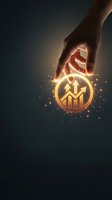Hand holding glowing gold growth chart icon with upward arrows and sparkling light effects against dark background for business success concepts.