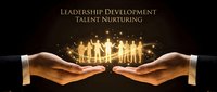Leadership development concept with two hands holding glowing golden silhouettes of people, symbolizing talent nurturing, mentorship, and professional growth for corporate training.