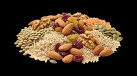 Assorted nuts, seeds, and dried fruits isolated on transparent background, ready for clipart, print-on-demand, sublimation, t-shirt design, and sticker applications.