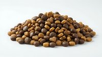 Pile of roasted coffee beans in various shades of brown isolated on white background for beverage industry and cafe design projects.