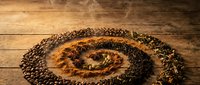 Coffee beans arranged in spiral pattern on rustic wooden table background for cafe menu design and beverage advertising concepts.