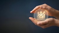 Hands holding glowing orb with upward trending chart and performance text symbol, representing business growth, success metrics, financial improvement, and strategic planning for corporate development.