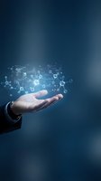 Businessman hand holding glowing digital network with connected nodes and data visualization icons on dark blue background for technology and innovation concepts.