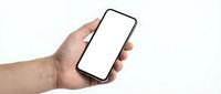 Hand holding smartphone with blank white screen mockup isolated on white background for app presentation and mobile interface design.