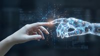 Human hand reaching toward futuristic robotic arm with glowing digital connections and network nodes representing AI technology and human-machine interaction.