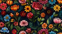 Vibrant folk art floral pattern with colorful blooms in red, orange, blue and pink against dark background. Seamless repeat design for fabric and wallpaper.