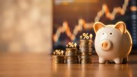 White ceramic piggy bank with stacked golden coins and percentage symbols, representing savings, investment growth, and financial planning for business and personal wealth management.