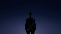 Silhouette of a man wearing a suit and holding a rifle against a dark blue gradient background, suitable for thriller, crime, action, and security-related projects.