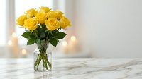 Fresh yellow roses bouquet in glass vase on marble table with warm bokeh lights creating romantic atmosphere for home decor and special occasions.