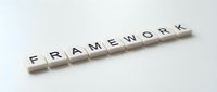 White letter tiles spelling FRAMEWORK on clean background for business planning and organizational structure concepts.