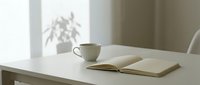 Young woman with light skin tone, professional appearance, seated at white desk with open notebook and ceramic mug, natural window light creating soft shadows, minimalist workspace for business, education, or creative work.