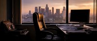 Executive office with leather chair overlooking downtown city skyline at sunset, modern workspace with computer and documents for business success concept.