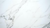 White marble texture with elegant gray veining patterns for luxury interior design backgrounds and sophisticated architectural surfaces.