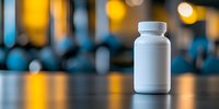 White medicine bottle on reflective surface with blurred warm bokeh lights in background, creating modern pharmaceutical presentation for healthcare marketing.