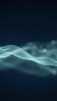 Abstract flowing light waves in turquoise and cyan tones against dark navy background. Ethereal smoke-like streams create elegant motion effect for modern design, technology, and corporate applications.
