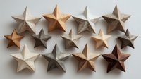 Rustic wooden star decorations in various sizes and natural wood tones arranged on white background for holiday crafting and home decor.