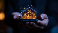 Glowing miniature house with warm lights and sparkles held in cupped hands against dark background, creating magical holiday atmosphere and cozy winter mood.