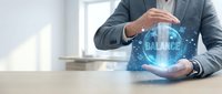 Businessman in formal suit holding glowing digital globe with balance text, representing global financial equilibrium, digital transformation, and worldwide business solutions.