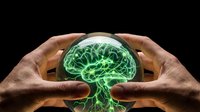 Protective hands surrounding glowing green brain with neural networks on black background representing mental health care and cognitive protection.