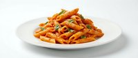 Crispy curly fries with seasoning served on white plate, isolated on white background, ready for food menu design and restaurant marketing.