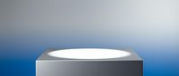 Modern gray cylindrical podium with white top surface on blue gradient background for product display and presentation purposes.
