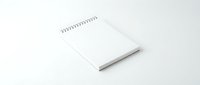 White spiral-bound notebook with blank pages on clean background for office supplies, education, writing projects and stationery mockups.