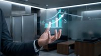 Businessman hand presenting holographic financial growth chart with upward trending arrows in modern office environment for business analytics presentations.