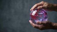 Person with dark skin tone holding glowing digital globe showing world map and network connections, representing global business, technology, and international communication concepts.