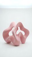 Abstract pink ceramic sculpture with organic flowing forms on white background for modern interior design and contemporary art projects.