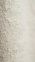 Cream colored textured fabric surface with woven pattern and smooth material contrast for interior design and textile applications.