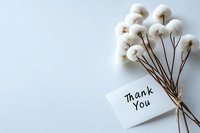 Natural cotton flowers bouquet with thank you note on light background, minimalist gratitude concept for greeting cards and appreciation messages.