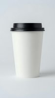 White disposable coffee cup with black lid isolated on gray background for branding mockup and cafe business design projects.