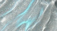 Shimmering holographic fabric with turquoise and silver waves, sparkling glitter texture for luxury fashion design, cosmic space backgrounds and futuristic concepts.