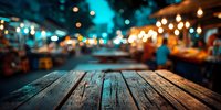 Rustic wooden table with blurred night market or street food festival in background, illuminated by warm lights and teal ambiance.
