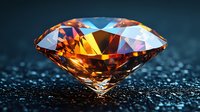 Brilliant amber diamond with light reflections on dark textured surface showcases luxury gemstone cut with precise facets and warm golden glow. For jewelry design.