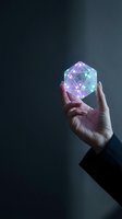 Hand holding glowing geometric polyhedron with purple and cyan neon light effects against dark background. Suitable for technology, innovation, and digital transformation concepts.