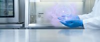 Scientist in laboratory holding digital brain hologram, representing artificial intelligence, neuroscience research, and advanced medical technology innovation.