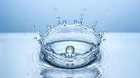 Young male with light skin tone, professional water dynamics specialist, captured mid-splash creating crown formation. Isolated on white background, ready for design use on packaging, wellness products, and marketing materials.
