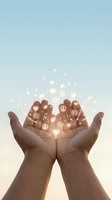 Open hands releasing glowing peace symbols and hearts into sky representing hope, spirituality, freedom and positive energy for wellness concepts.