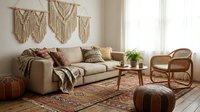 Cozy boho living room with macrame wall art, neutral sofa, woven chair and moroccan poufs creating warm modern interior design for home decor inspiration.