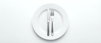 Empty white plate with fork and knife on white background, suitable for restaurant menus, dining concepts, and food service design projects.