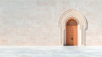 Minimalist architectural detail of arched wooden door with ornate pattern in stone wall facade, featuring clean lines and neutral tones. Suitable for modern design projects.