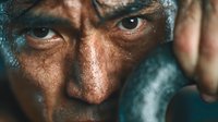 Elderly man with weathered face and intense gaze showing signs of aging and life experience in dramatic lighting for storytelling projects.