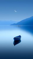 Solitary blue boat on calm lake with crescent moon and mountain silhouettes in dreamy blue twilight atmosphere.