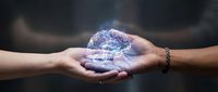 Glowing digital brain with neural networks floating above cupped hands representing artificial intelligence, technology innovation and human-machine collaboration.