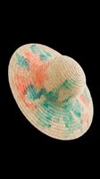 Woven straw sun hat with coral and teal geometric patterns, isolated on transparent background. Ready for fashion design, e-commerce, print-on-demand products, and digital marketing materials.
