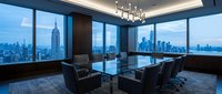 Modern executive boardroom with panoramic city skyline view through floor-to-ceiling windows, featuring glass conference table and leather chairs for meetings.