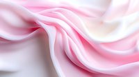 Soft pink and white flowing fabric waves creating elegant abstract curves and smooth textures for luxury design projects and feminine branding materials.