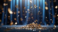 Gold glitter particles falling and forming pile against blue light beams background, festive celebration atmosphere with magical sparkle effect.