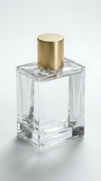 Empty luxury fragrance bottle with brushed gold cylindrical cap and clear glass rectangular container, isolated on white background, ready for product design, branding, and cosmetic packaging mockups.